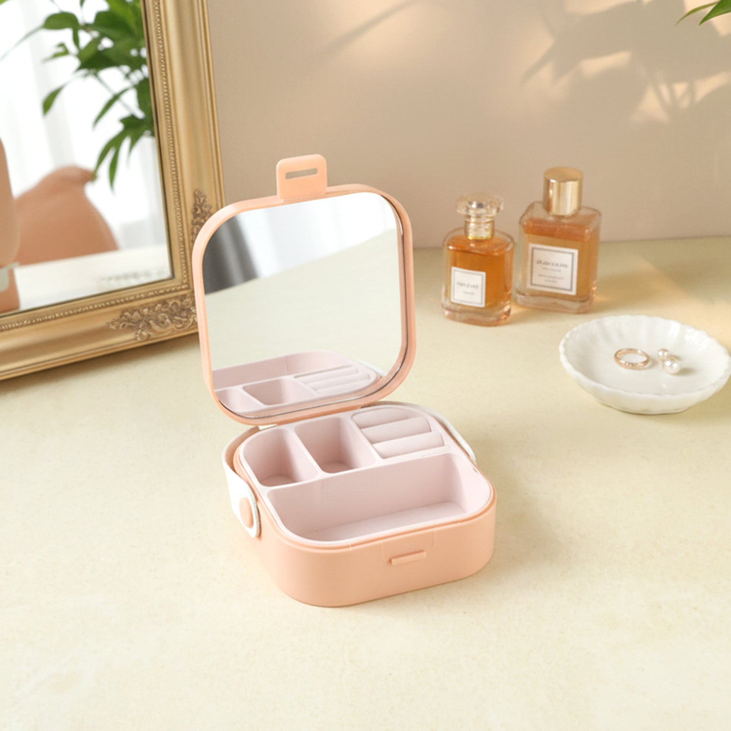 Wukusy portable mini jewelry storage box with compartments, compact design for organizing rings, earrings, and small jewelry pieces