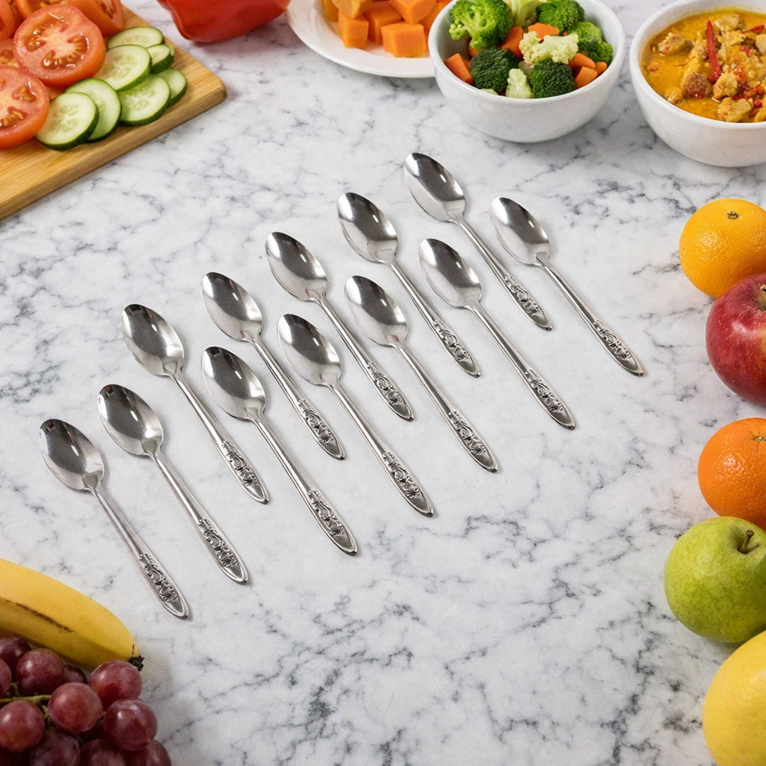 Set of 12 stainless steel table spoons from Wukusy, featuring polished handles and ergonomic design for dining use.