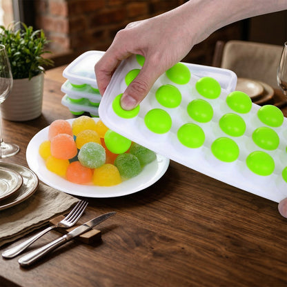 Wukusy 21-grid plastic round pop ice cube tray with lid, showing the tray filled with round ice cubes and a clear lid.