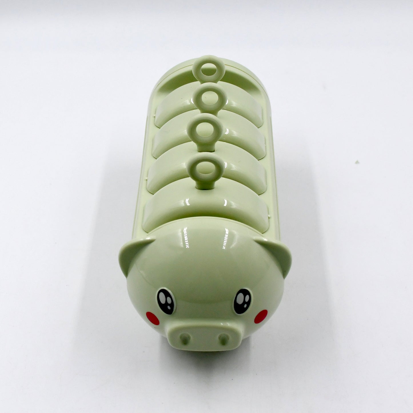Wukusy pig shape ice candy mold set with 4 plastic cups for making ice pops, ice candies, and kulfi treats.
