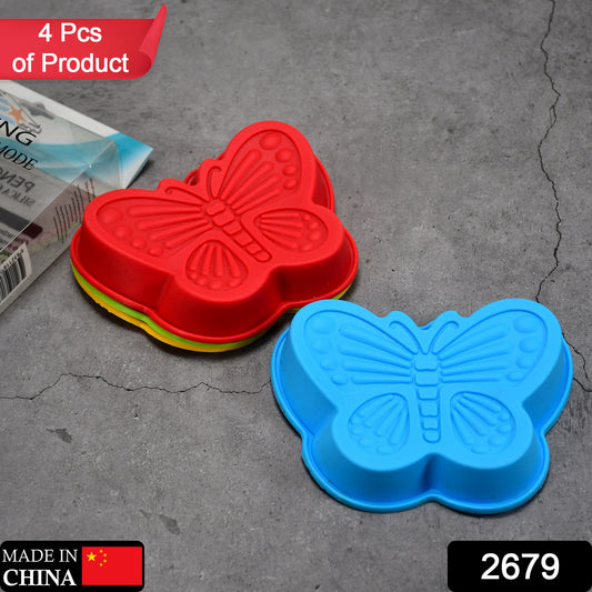 Set of four Wukusy butterfly-shaped silicone cake and muffin liners, oven and microwave safe, ideal for baking and soap making.