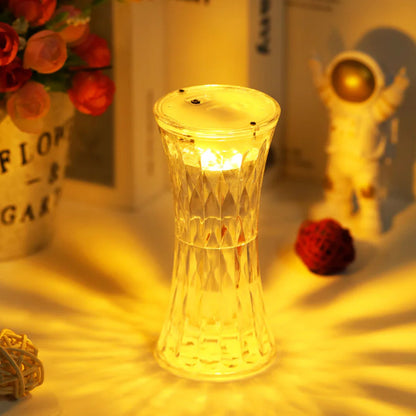 Wukusy 8440 Crystal Lamp night light with transparent crystal design, soft lighting for nursery, bedroom, or study decor.