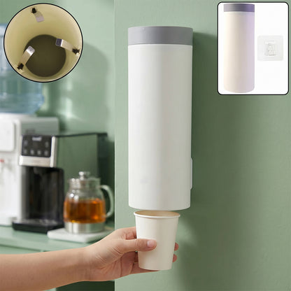 Wall-mounted Wukusy paper cup holder and dispenser for disposable cups, shown in a clean, organized storage setup.