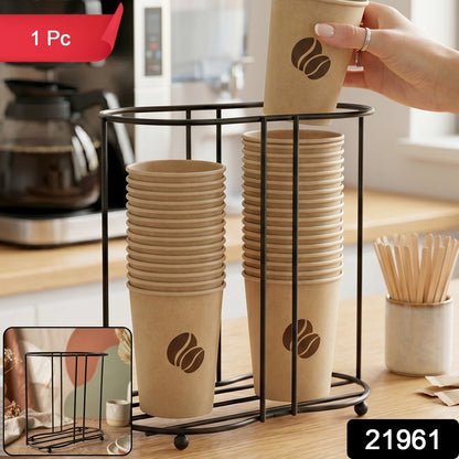 Wukusy metal desktop water cup holder holding a water cup on a desk, compact and durable for convenient beverage placement.