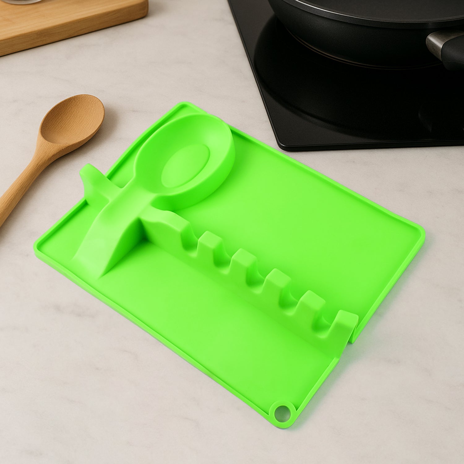 Silicone multifunctional spoon holder and spatula rack by Wukusy with four slots for kitchen utensils, black color, compact design.