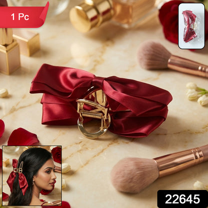 Wukusy elegant satin bow hair claw clip for women, showcasing a stylish satin bow design on a black hair clip.