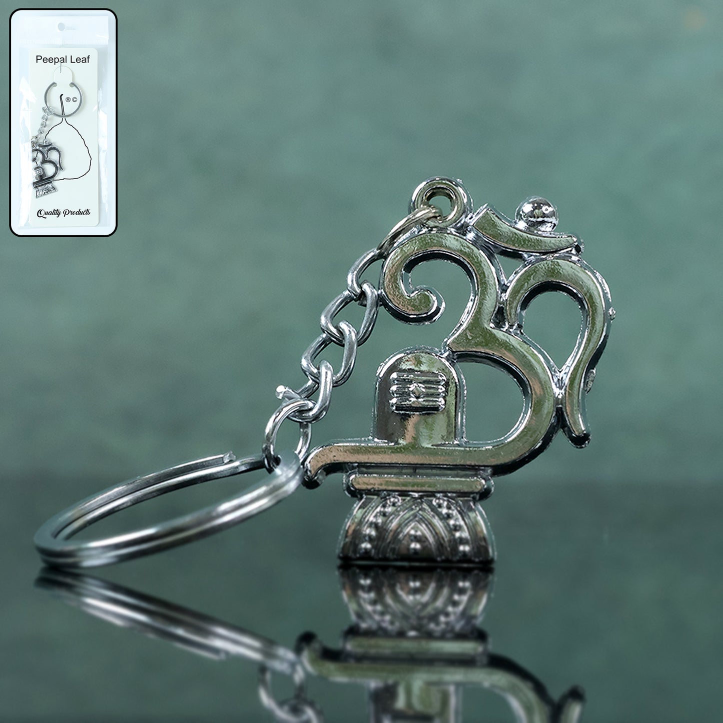 Wukusy metal keychain featuring Om symbol with Shivling design, showcasing intricate details and polished finish.