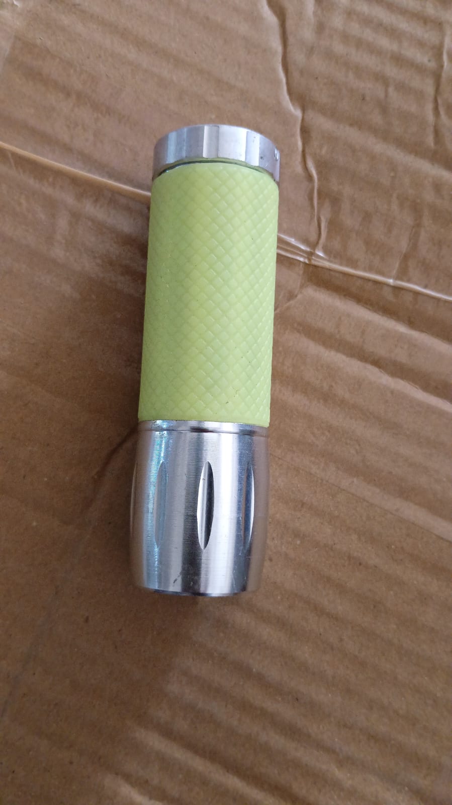 Wukusy portable mini torch flashlight with 9 LED bulbs, compact pocket design, powered by 3 batteries, ideal for emergency use