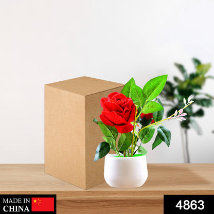 Artificial rose flower plant in a decorative pot by Wukusy, ideal for home or office decor and gifting.
