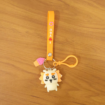 Cute cartoon animal ice cream strap keychain featuring a colorful animal character by Wukusy, perfect for keys or bags.