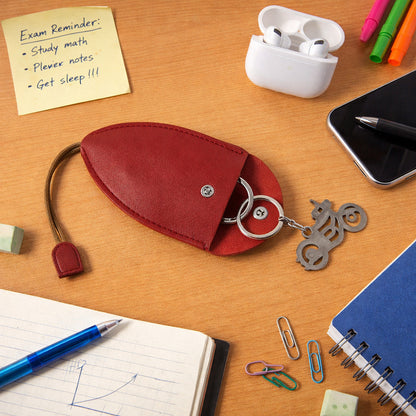 Wukusy stylish compact keyholder pouch in black with multiple keyring slots and a secure zipper closure.