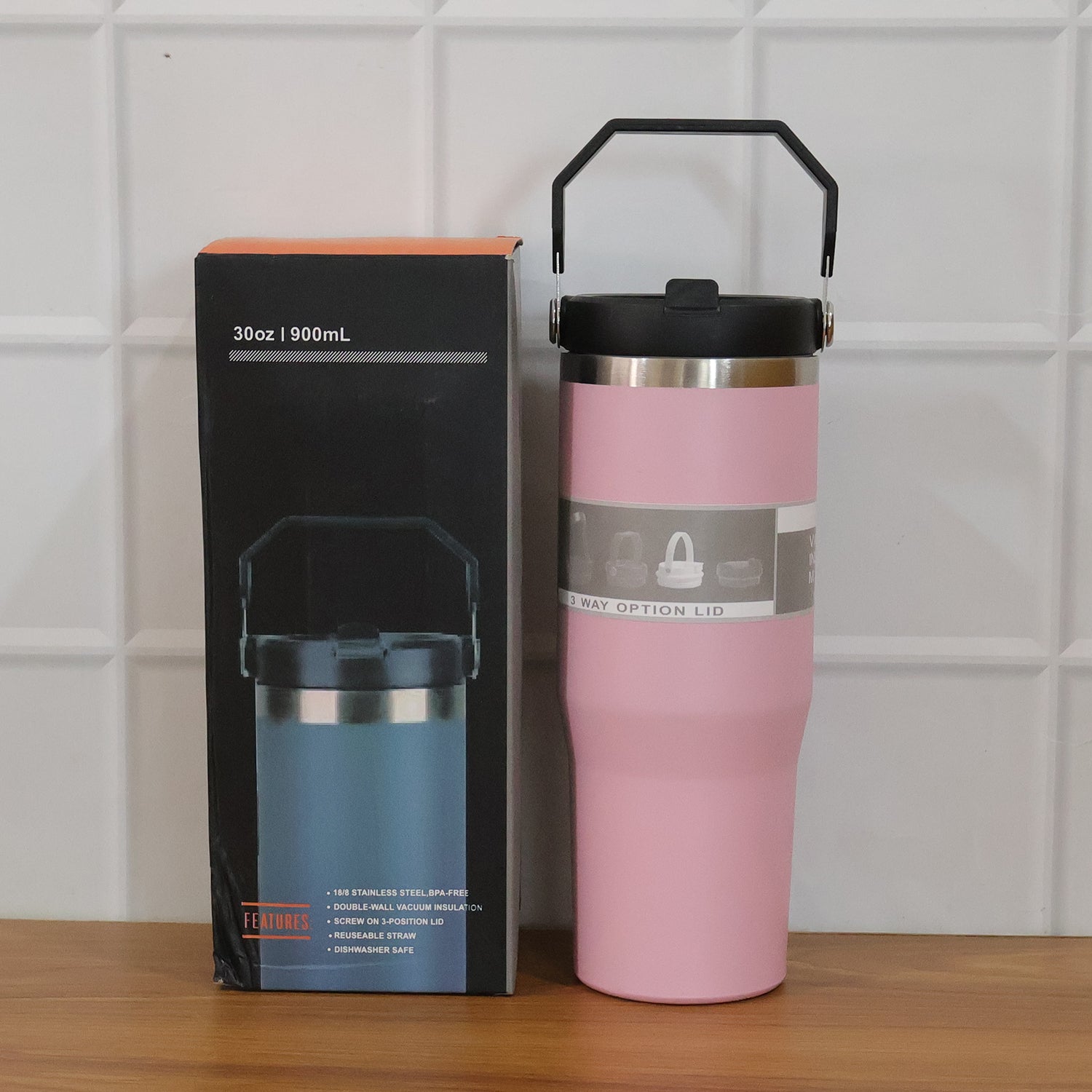 Wukusy premium stainless steel insulated travel tumbler, 900ml capacity, with a sleek design and secure lid for hot or cold drinks.