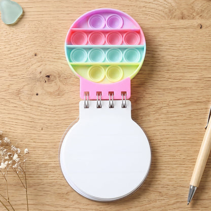Wukusy Mini Pop It Diary fidget notebook for kids with rainbow silicone bubbles, portable and colorful sensory toy.