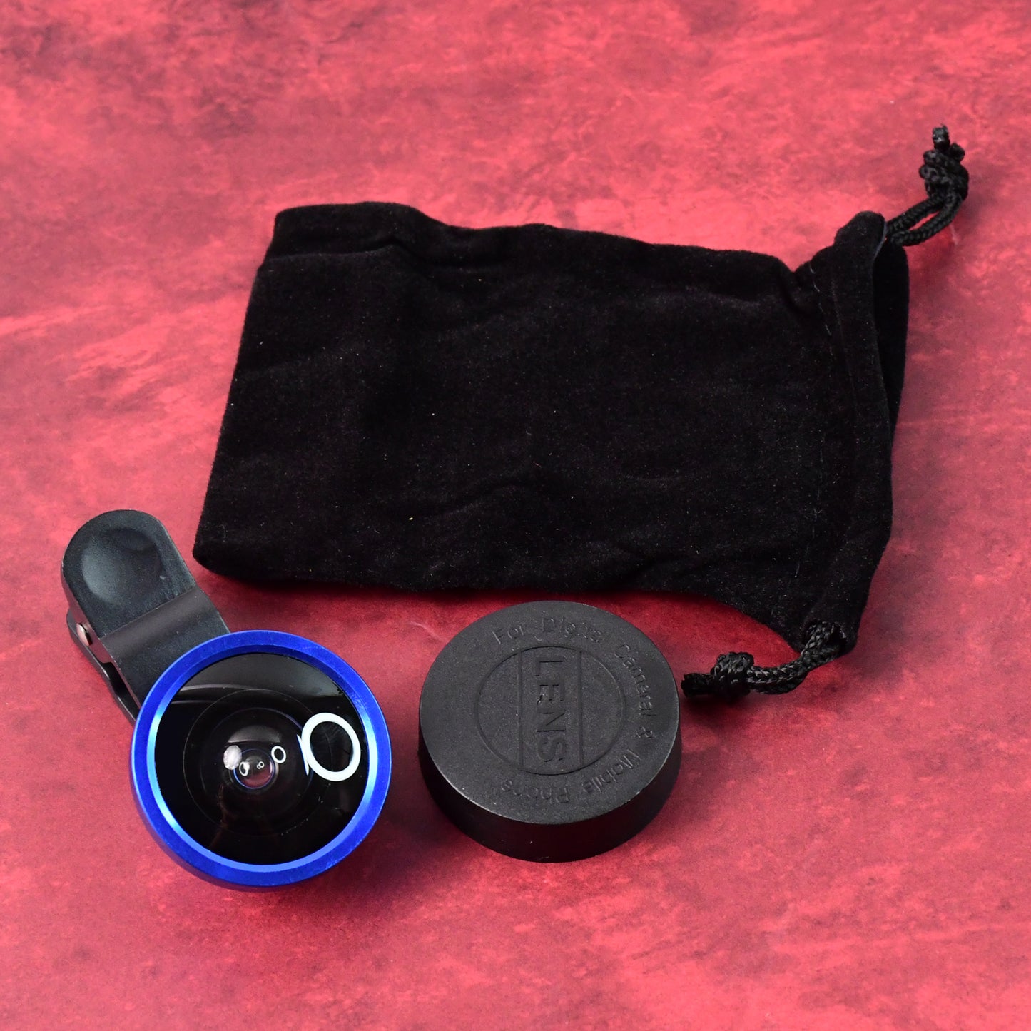 Wukusy universal clip-on selfie camera lens set attached to a smartphone for enhanced photo capturing.