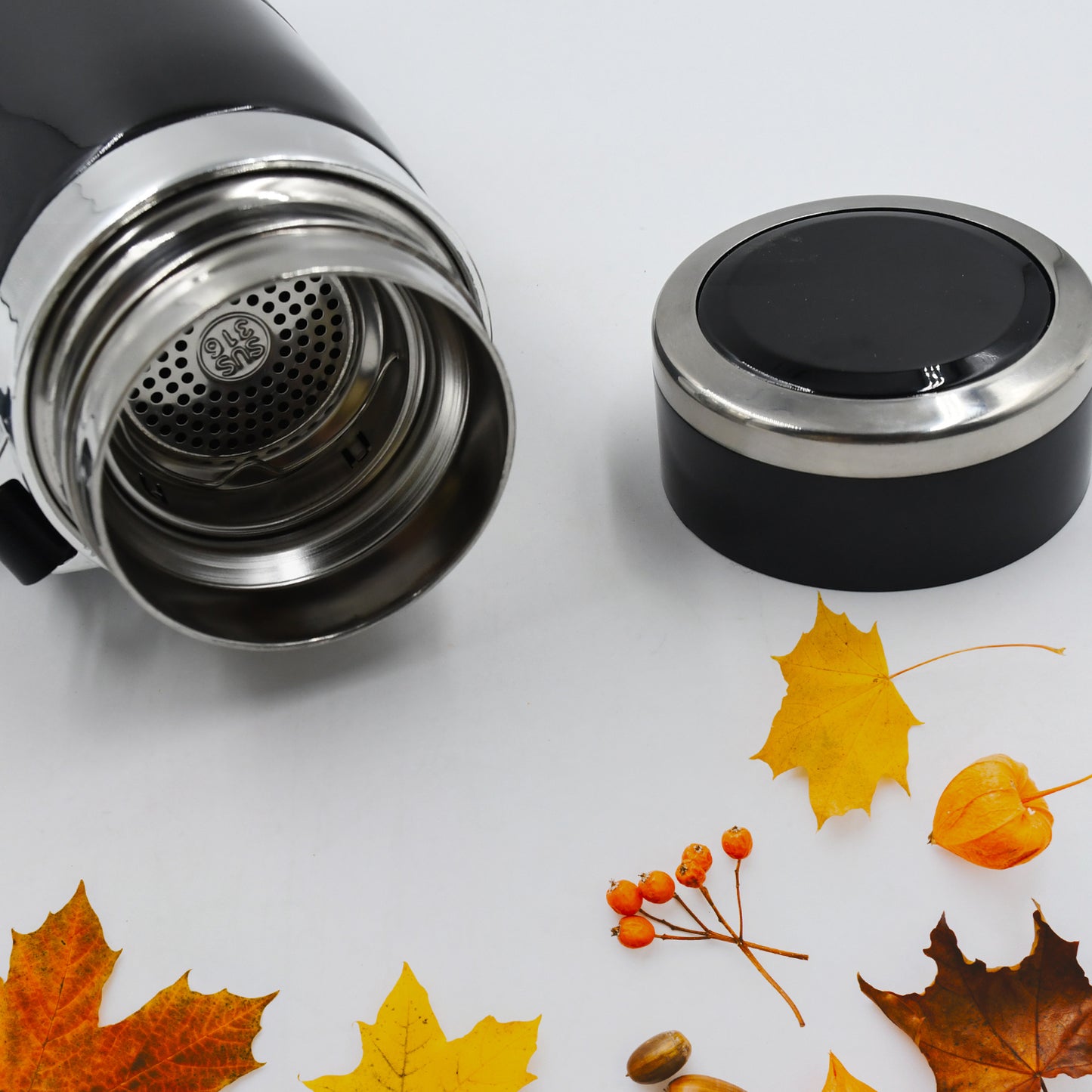 Double stainless steel wall flask by Wukusy, vacuum insulated water bottle with sleek design and durable construction.