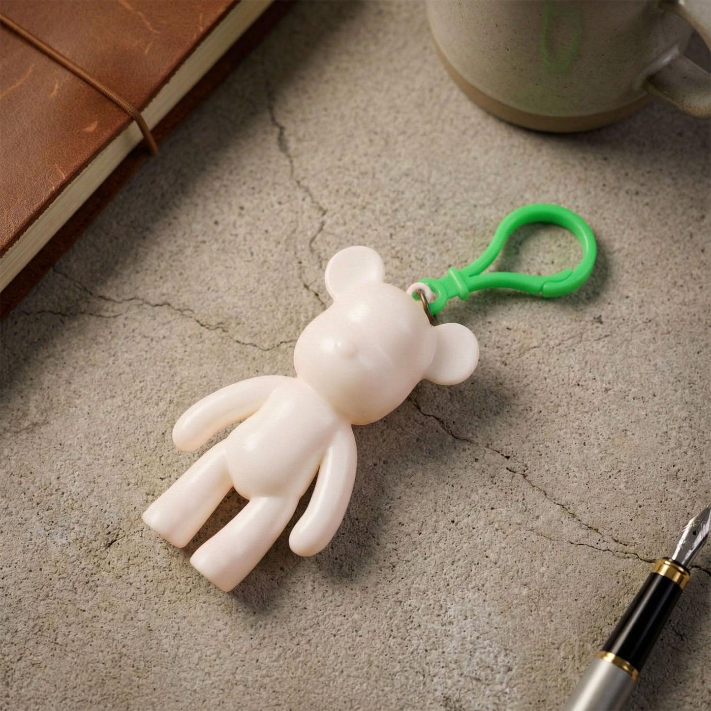 Cute bear-shaped decorative keychain by Wukusy featuring a soft, plush bear design with a silver keyring attachment.