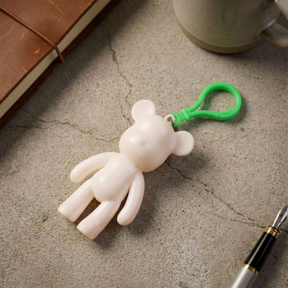 Cute bear-shaped decorative keychain by Wukusy featuring a soft, plush bear design with a silver keyring attachment.