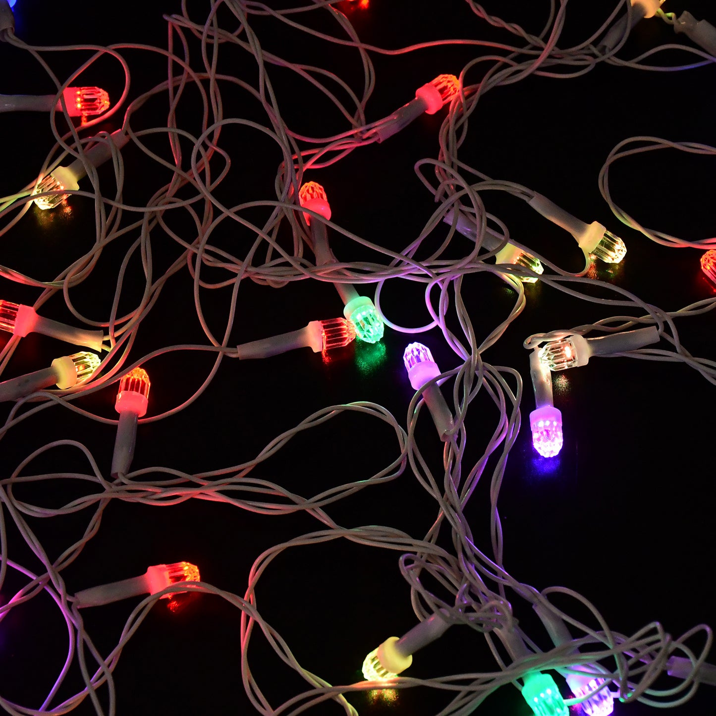 Colorful LED decorative string light by Wukusy, 8 meters long, with multi-color LED bulbs for festive or ambient lighting.