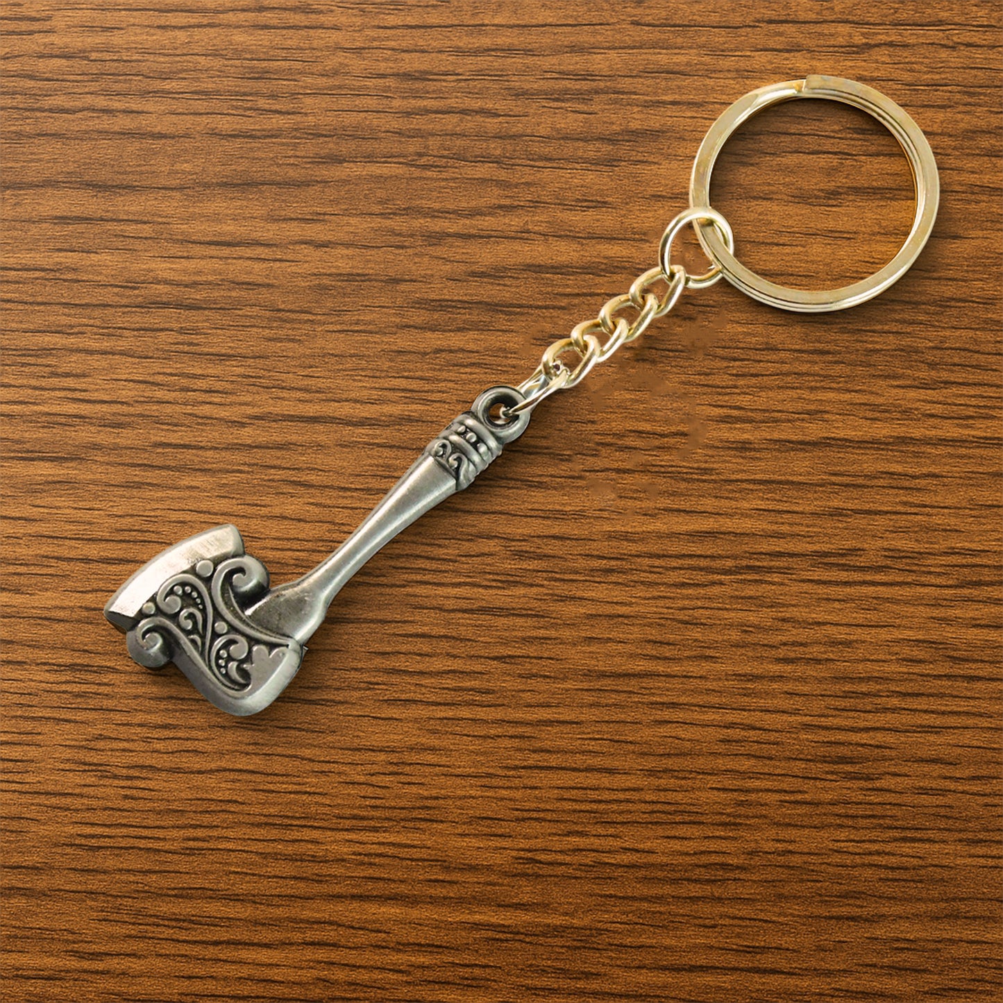 Wukusy stylish axe-shaped metal keychain with a sleek design, perfect for keys or as a decorative accessory.