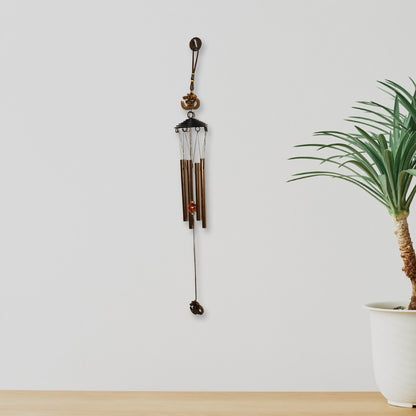 Metal wind chime with Om symbol, decorative outdoor decor by Wukusy, featuring hanging metal tubes and spiritual Om design.