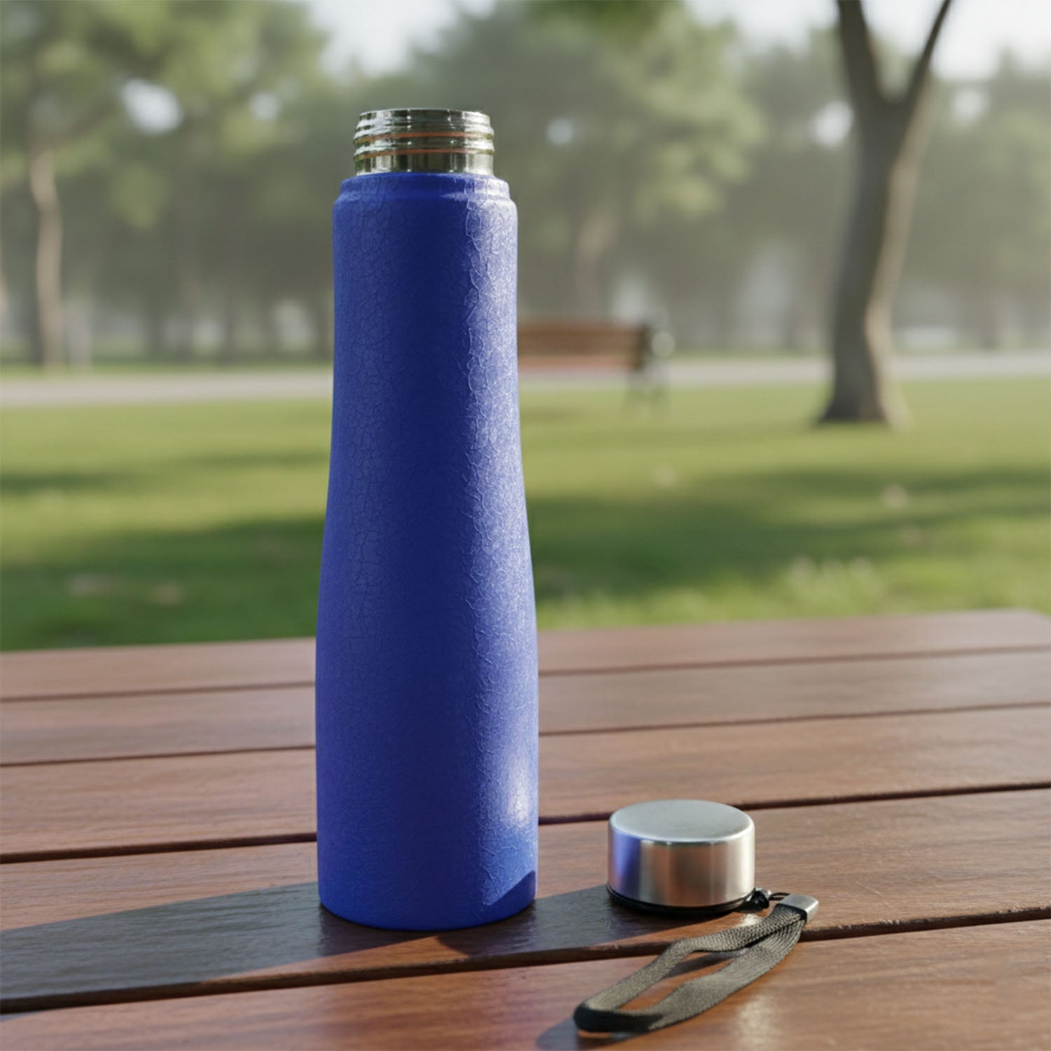 Blue Wukusy stainless steel water bottle, 1000 ml, durable and sleek for everyday hydration.