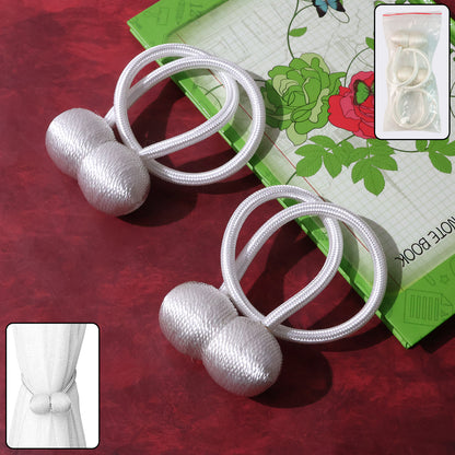 Pair of Wukusy magnetic curtain tiebacks holding curtains open, made of durable fabric for home improvement.