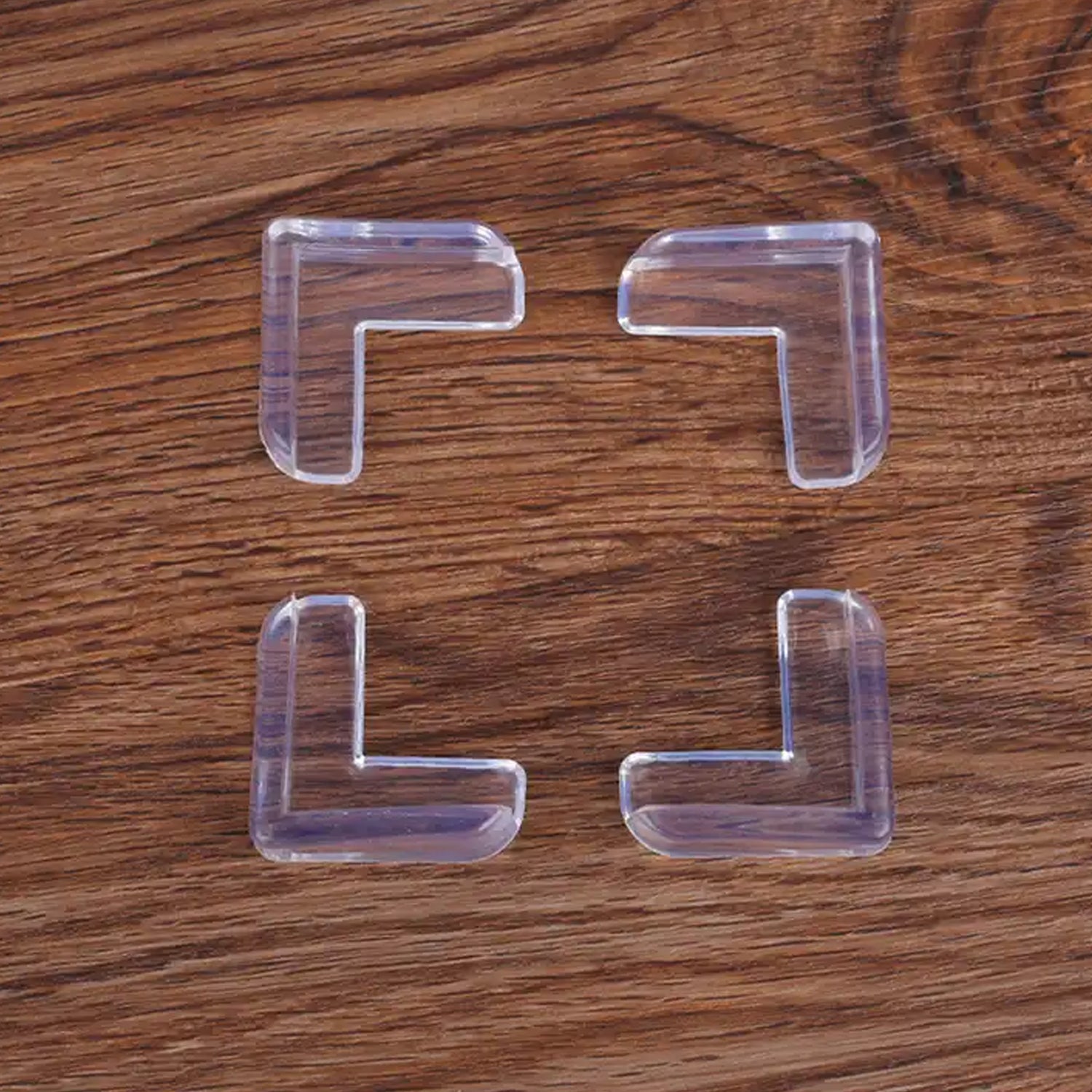 Wukusy 1696 Table Corners Edge Protector Guards for baby and child safety, set of 4, soft plastic corner cushions for home safety.
