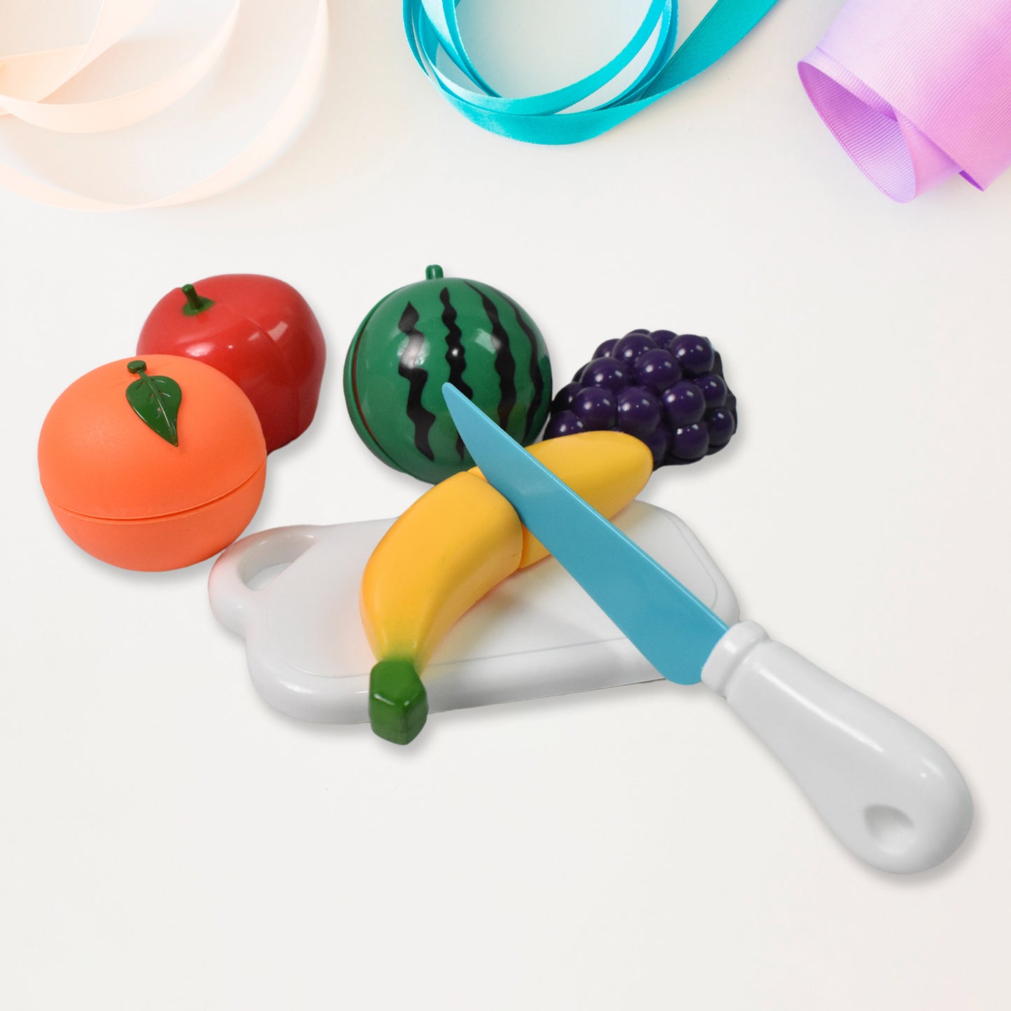 Wukusy 7-piece realistic sliceable fruits play toy set featuring colorful, cuttable fruit replicas for imaginative play