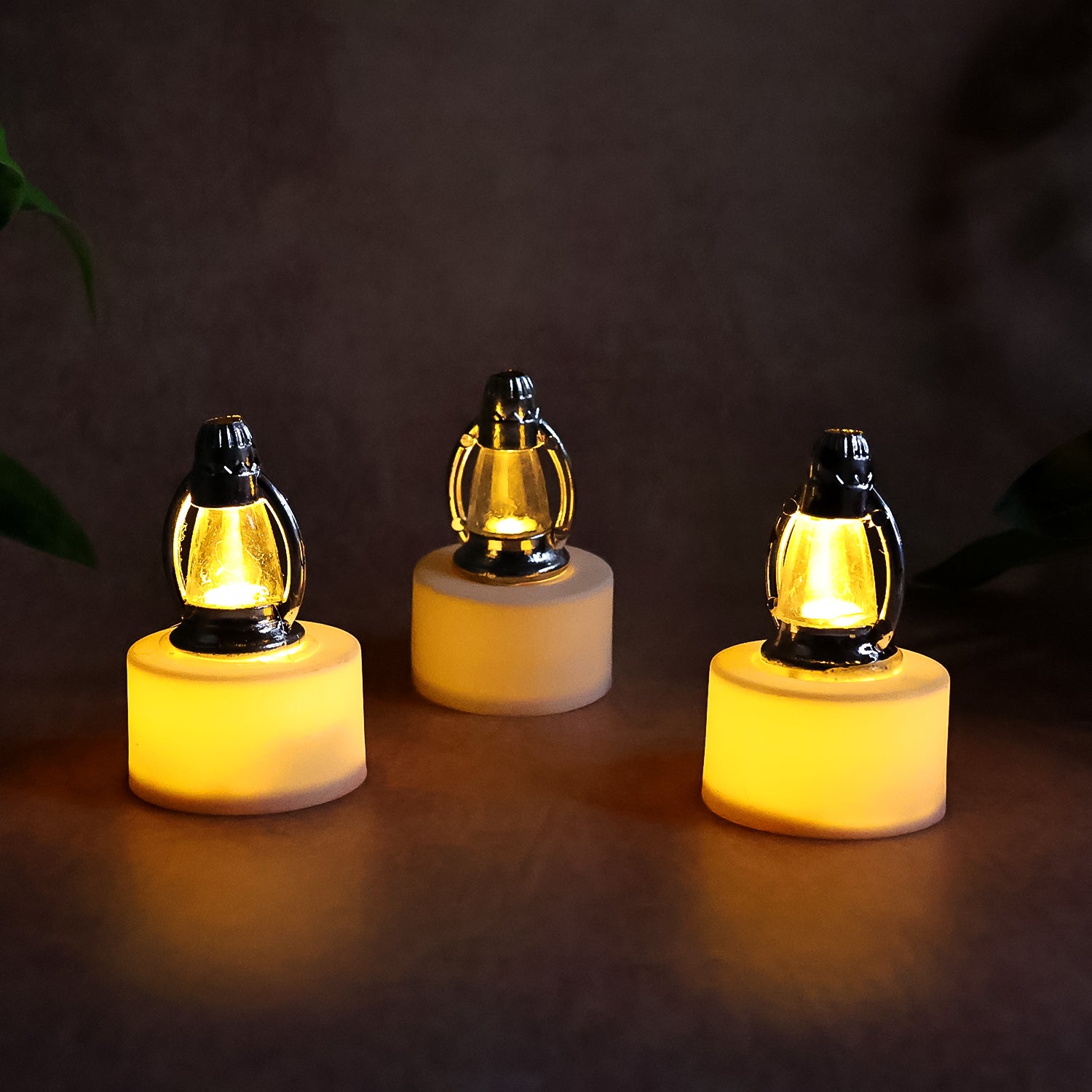 Six decorative LED lantern candles from Wukusy, ideal for home decor, featuring a warm, ambient glow and intricate design.