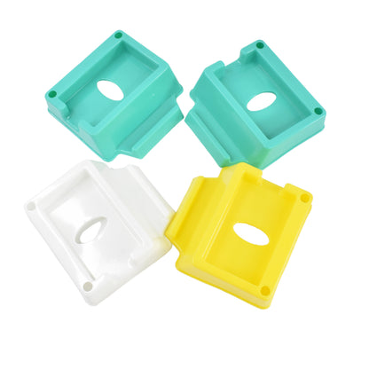 Set of four Wukusy plastic mobile phone stand holders, compact and lightweight for hands-free viewing and device stability.