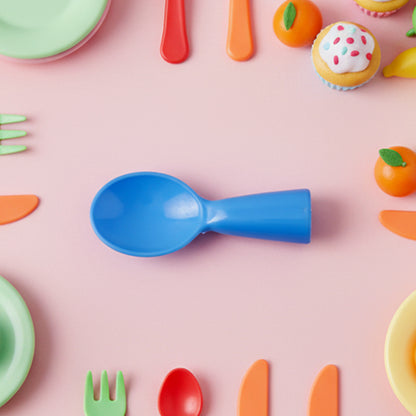 Mini Finger Spoon Toy by Wukusy, a small colorful plastic spoon designed for fun and sensory play.