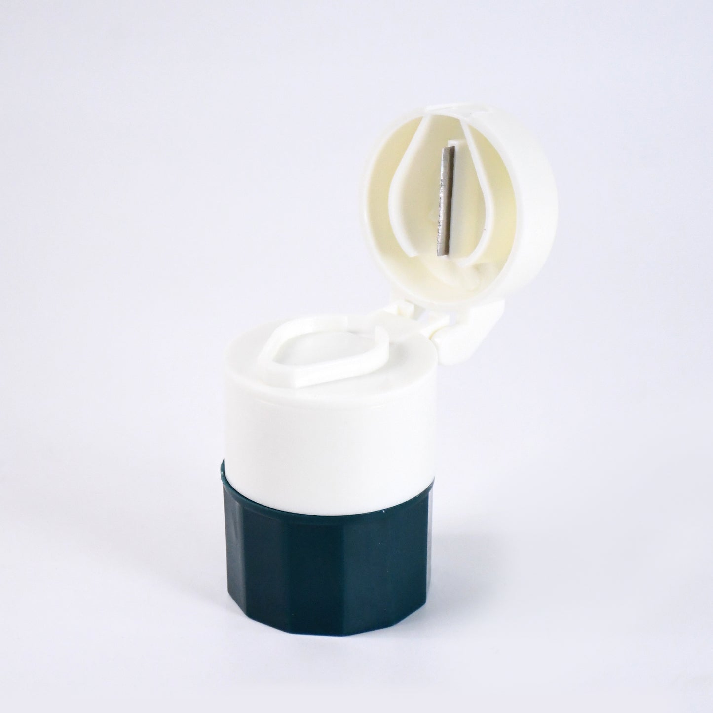 Wukusy 4-in-1 Pill Crusher and Grinder with durable grinding mechanism and compact design for easy medication splitting and crushing.
