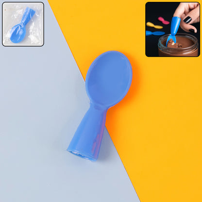 Mini Finger Spoon Toy by Wukusy, a small colorful plastic spoon designed for finger play and sensory fun.
