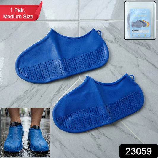 Blue waterproof silicone shoe covers by Wukusy, pair in medium size, protecting shoes from water and mud.