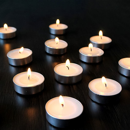 Set of 50 smokeless tealight candles by Wukusy, arranged in a decorative holder, perfect for ambient lighting.