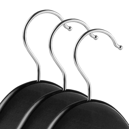 Wukusy premium cloth hanger with metal hook for shirts, coats, and tops, showcasing a sturdy, sleek design in a wardrobe setting