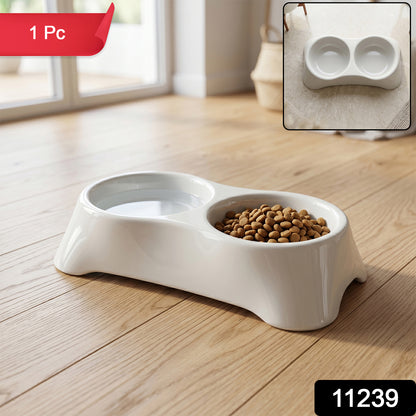 Wukusy dual pet food and water feeding tray with two bowls for dogs and cats, made of durable plastic.