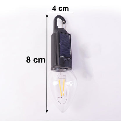 Wukusy solar rechargeable camping lamp with warm LED light, carabiner clip, compact outdoor light for camping and hiking.