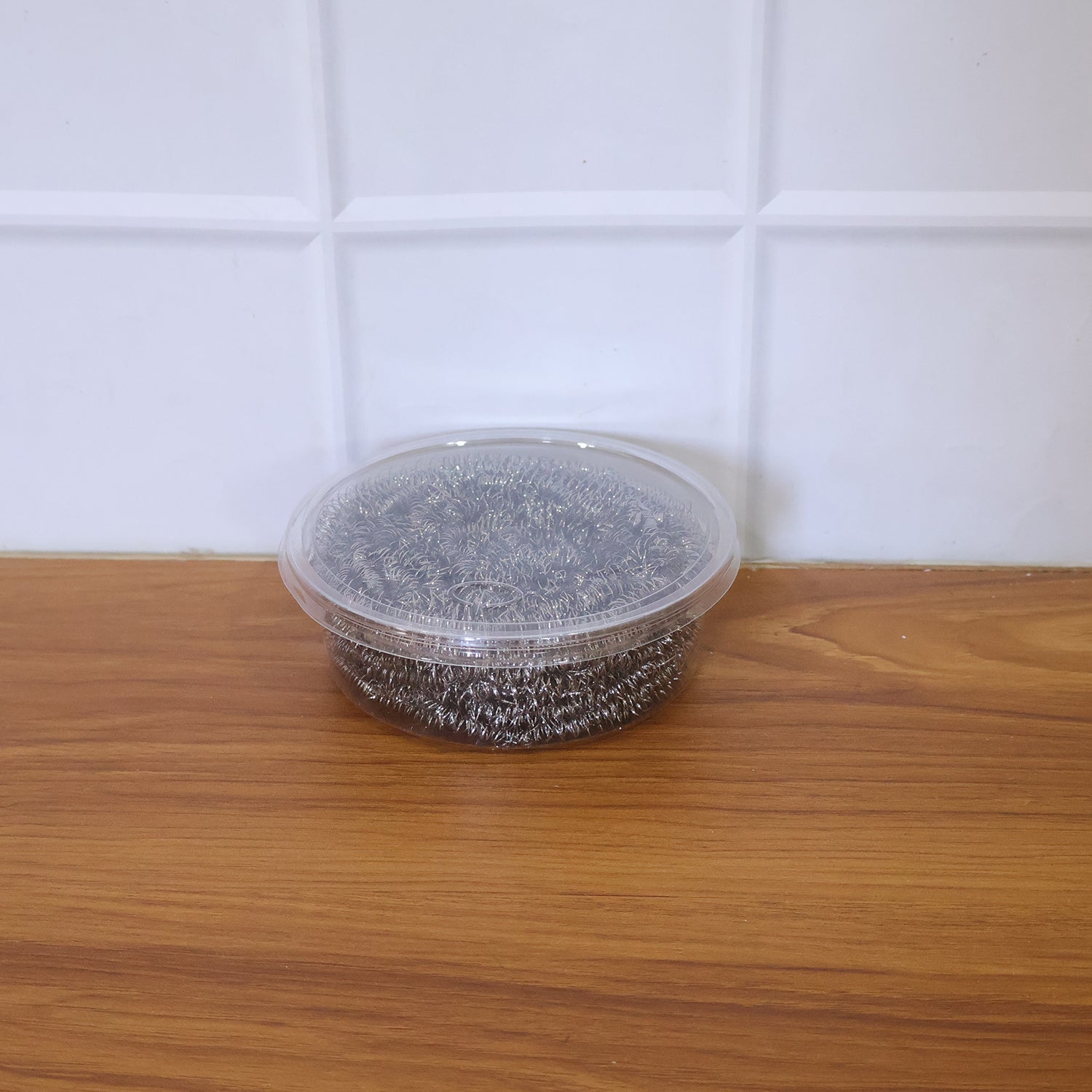 Wukusy stainless steel kitchen scrubber, 25g, durable and versatile cleaning tool with metal bristles for dishes and cookware.