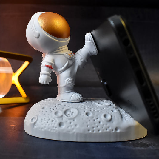 Wukusy astronaut-themed 3D mobile holder and phone stand with planet design, ideal for creative mobile accessories.