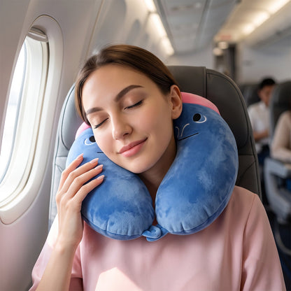 Blue U-shaped neck pillow featuring a cute character design, soft travel support from Wukusy, ideal for comfortable journeys.