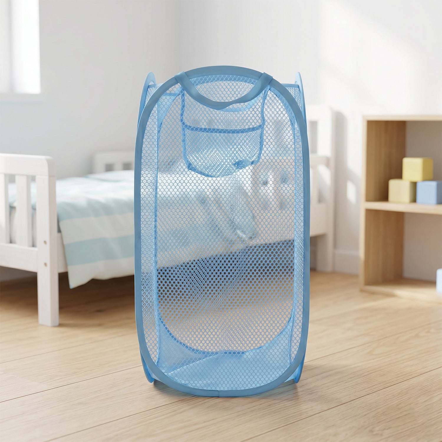 Large Wukusy mesh pop-up laundry basket for clothes storage, 54x30cm, lightweight and breathable with sturdy handles.