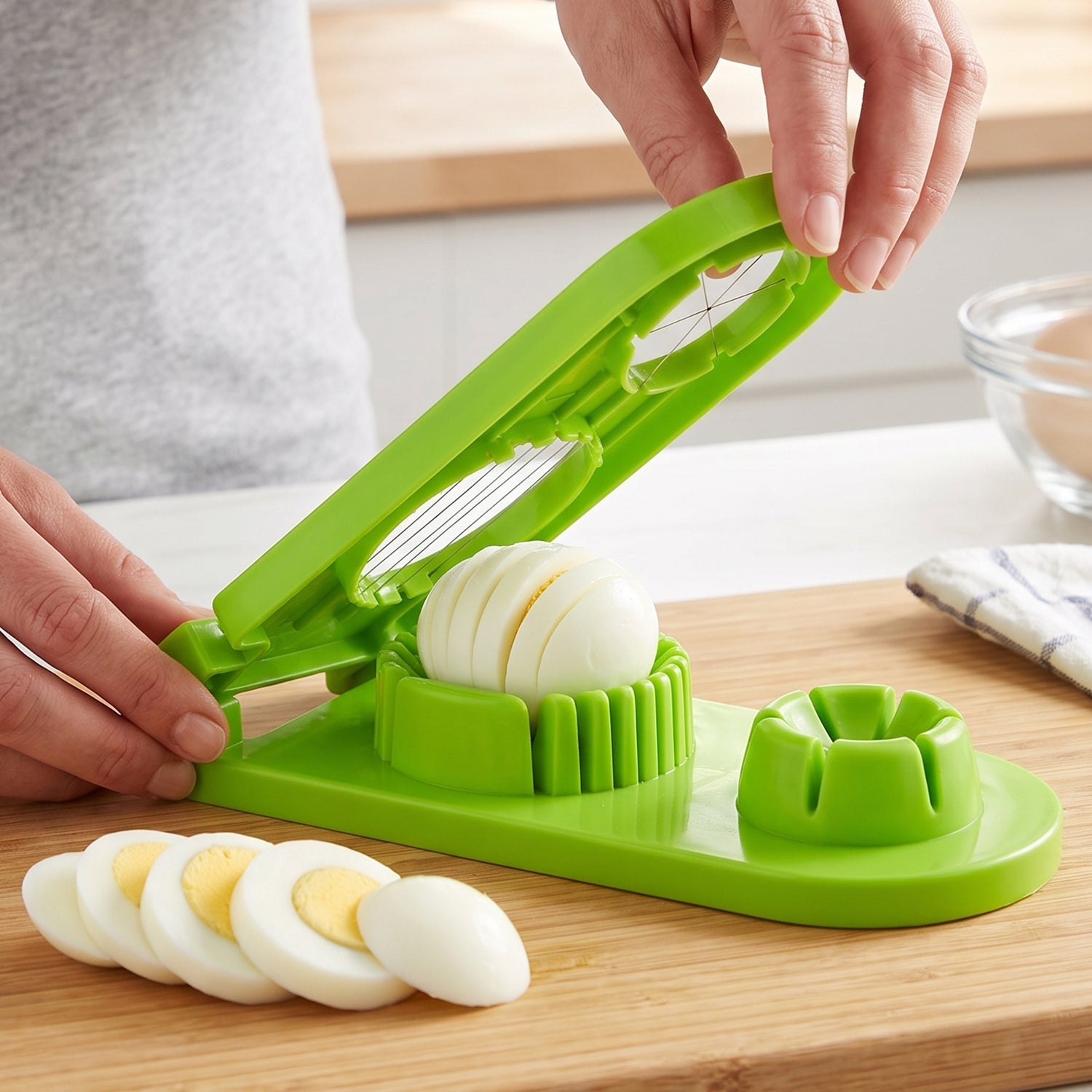 Wukusy 2-in-1 egg slicer and wedger with stainless steel wires, ideal for slicing boiled eggs evenly.