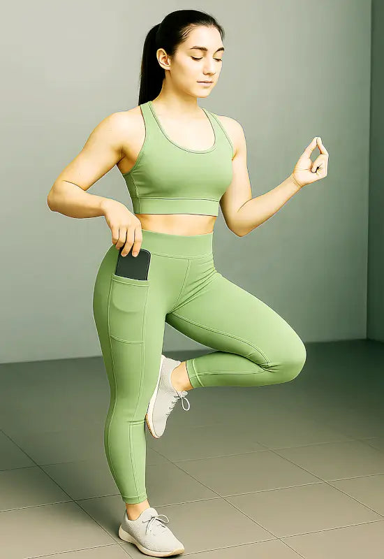 Ekom women's stretchable yoga tights with soft mid-waist design, ideal for workout and gym activities.