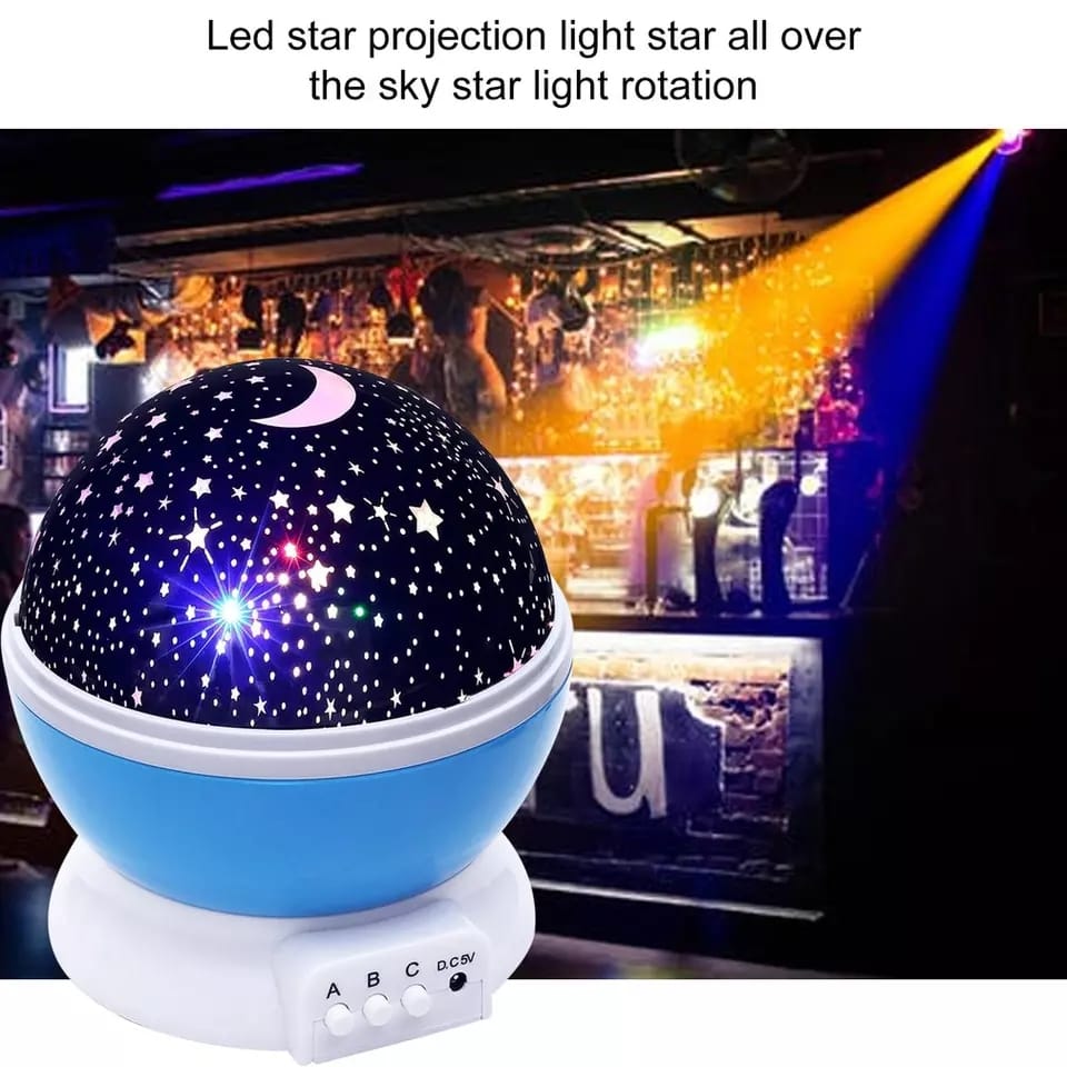 Wukusy 1234 Colour Changing Good Night Star Master rotating projection night lamp illuminating a child's bedroom with star patterns