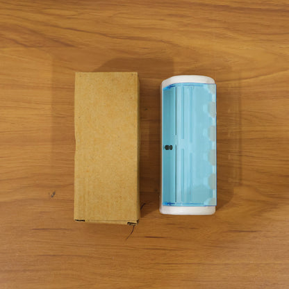 Wall mounted Wukusy toothbrush holder with protective cover, featuring a sleek design and secure wall attachment.
