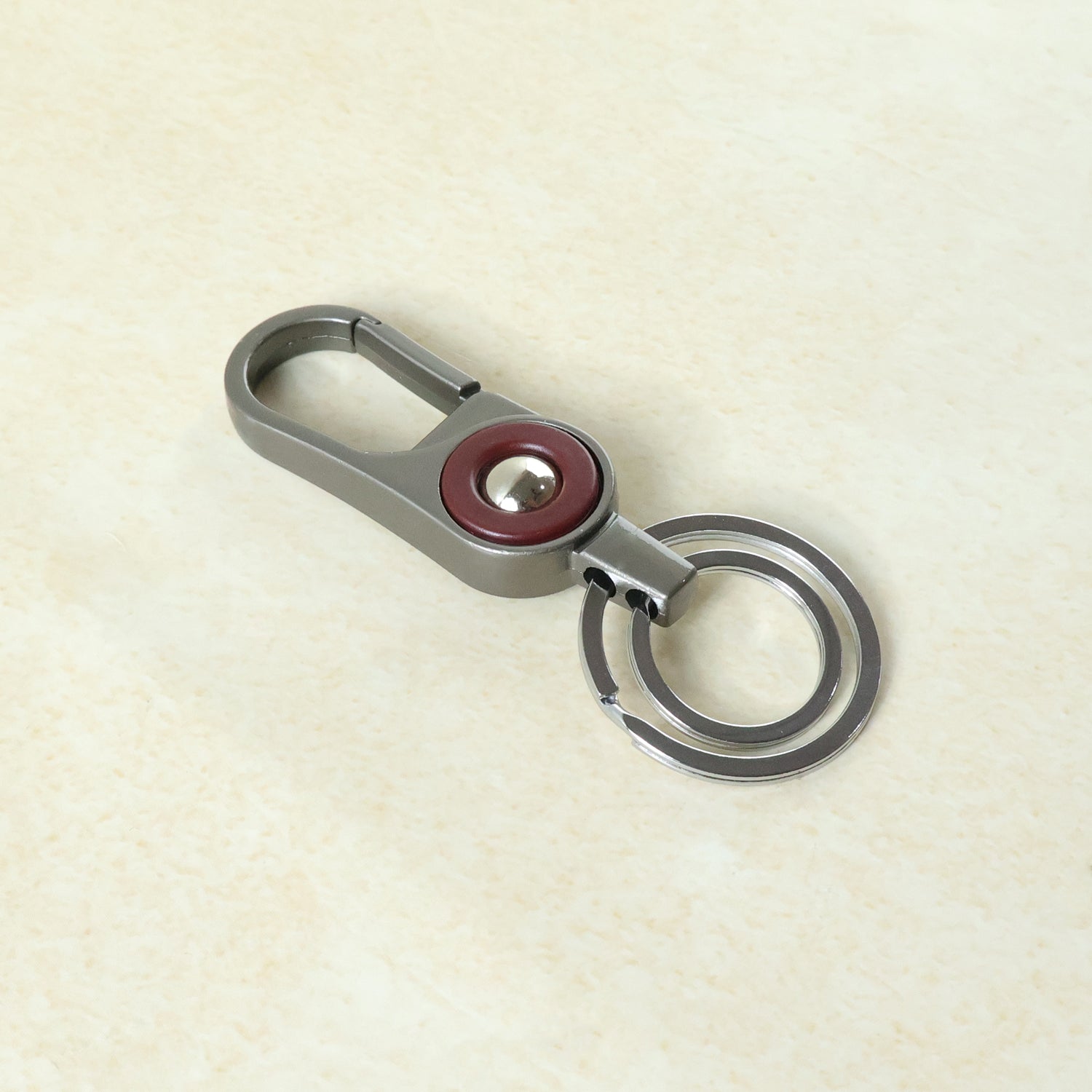 Wukusy premium metal key holder with dual rings and secure clip, compact and durable for organizing keys and accessories.