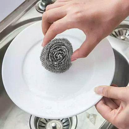 Wukusy stainless steel round ball scrubber, a durable kitchen tool for cleaning pots and pans, with a compact, spherical design.