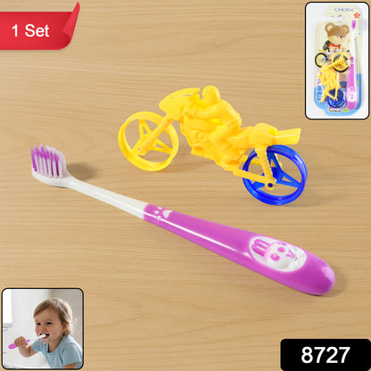 Kids toothbrush and bike toy set by Wukusy, featuring colorful toothbrush and miniature bike toy for children.