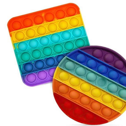 Rainbow-colored Wukusy fidget toy with random shapes, perfect for stress relief and sensory play.